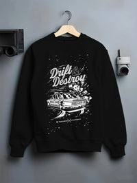 Black crewneck sweatshirt on a hanger against a grey wall, featuring racing drift street retro performance motorsport graphic.