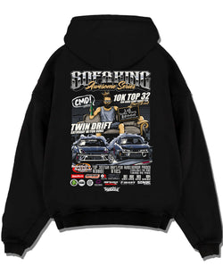 Black pullover hoodie laid flat on a white background, featuring racing drift jdm tuner street enthusiast show performance graphic.