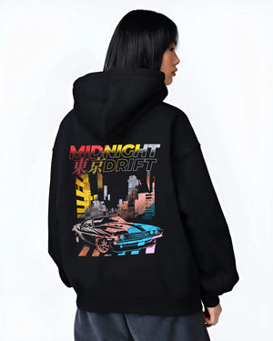 Black hoodie worn by a female model, back view, featuring racing drift jdm japanese muscle tokyo street midnight tokyo graphic.