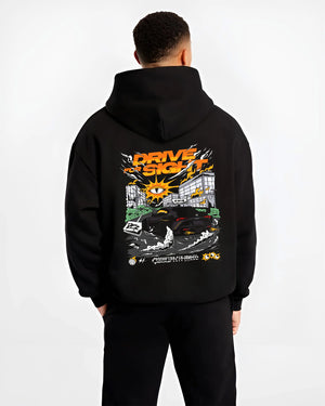 Black hoodie worn by a male model, back view, featuring racing drift street performance motorsport automotive enthusiast graphic.