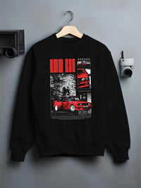 Black crewneck sweatshirt on a hanger against a grey wall, featuring BMW rs turbo racing drift motorsport euro german graphic.