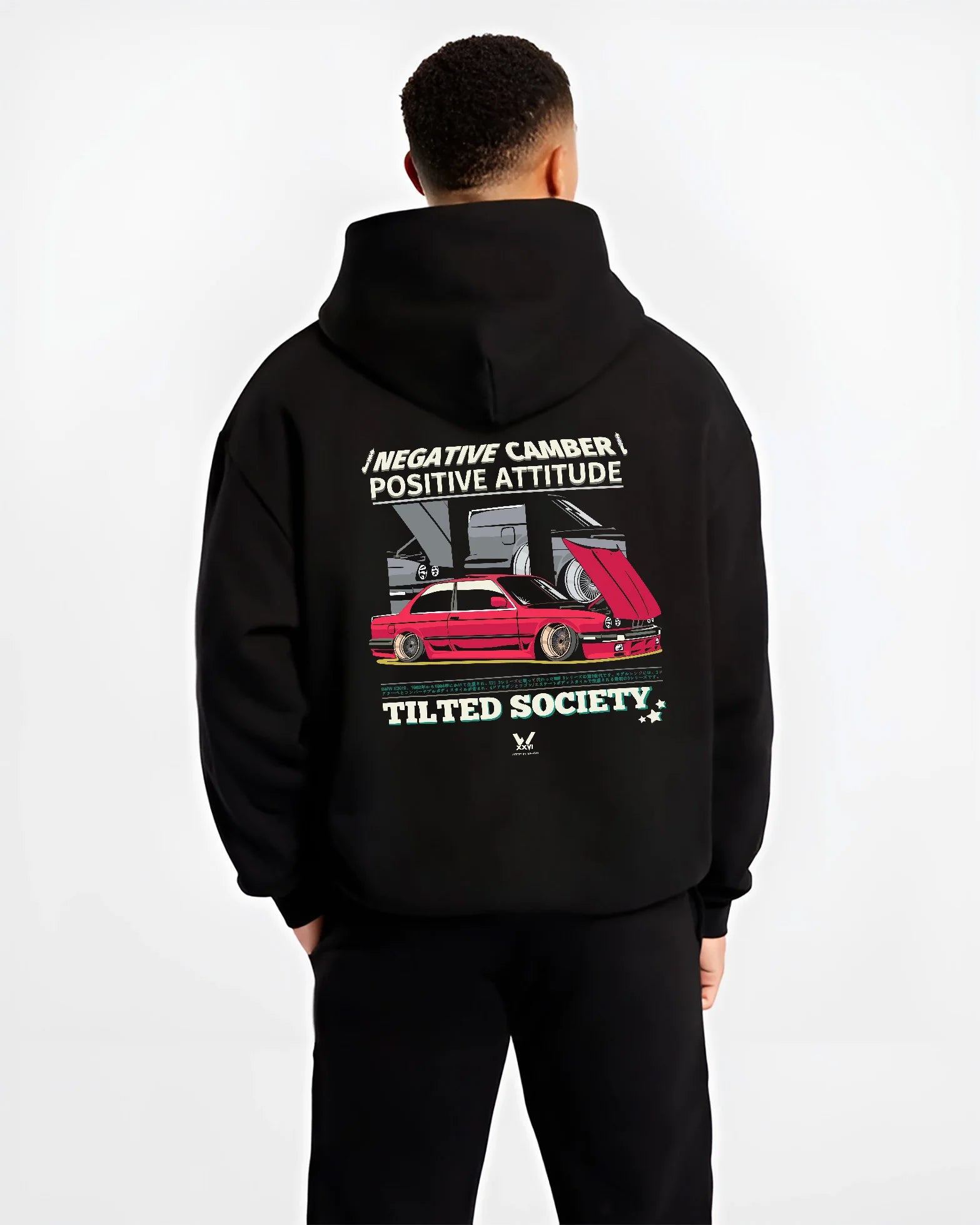 Black hoodie worn by a male model, back view, featuring BMW E30 rs turbo racing drift motorsport jdm euro street retro graphic.