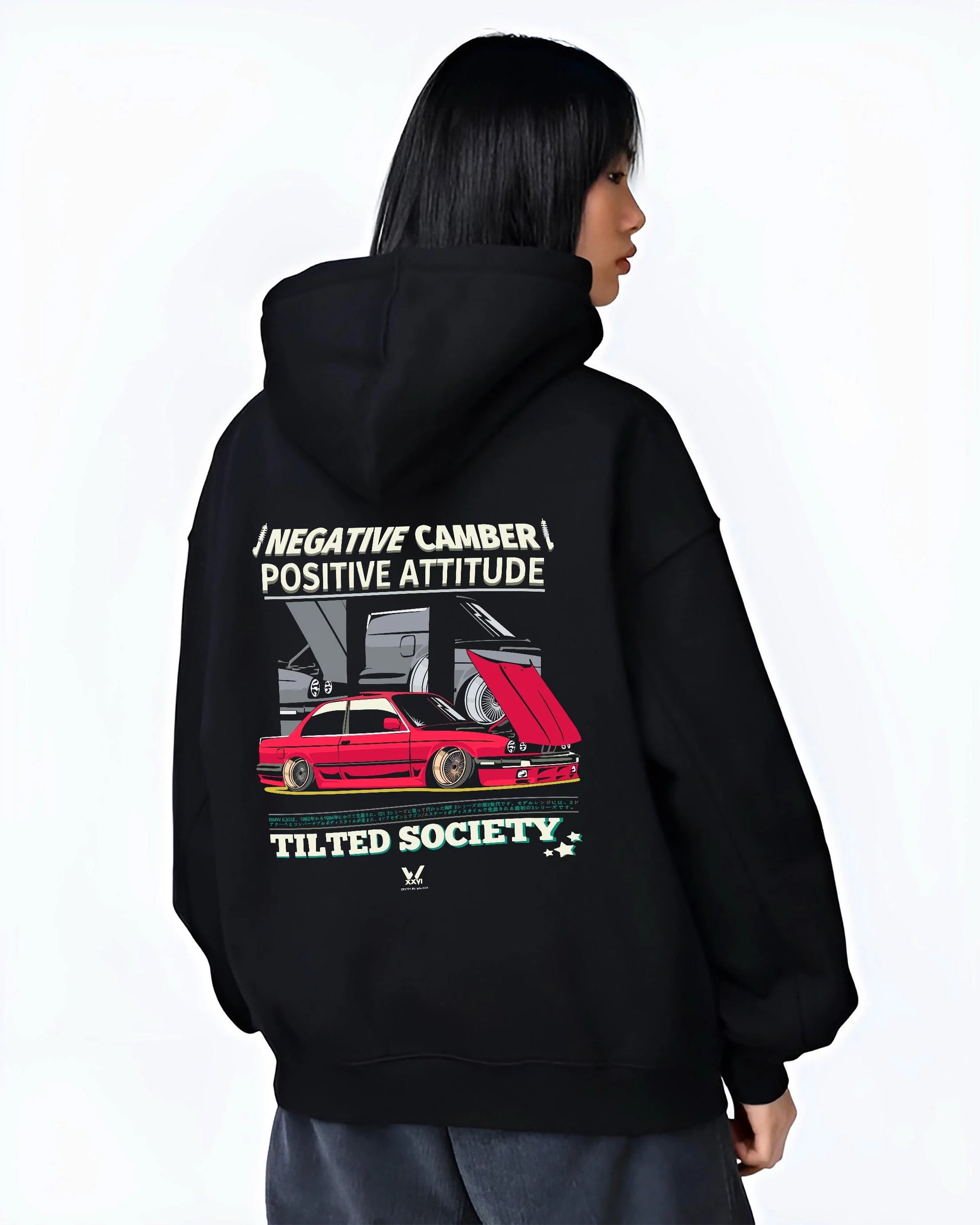 Black hoodie worn by a female model, back view, featuring BMW E30 rs turbo racing drift motorsport jdm euro street retro graphic.