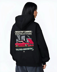 Black hoodie worn by a female model, back view, featuring BMW E30 rs turbo racing drift motorsport jdm euro street retro graphic.