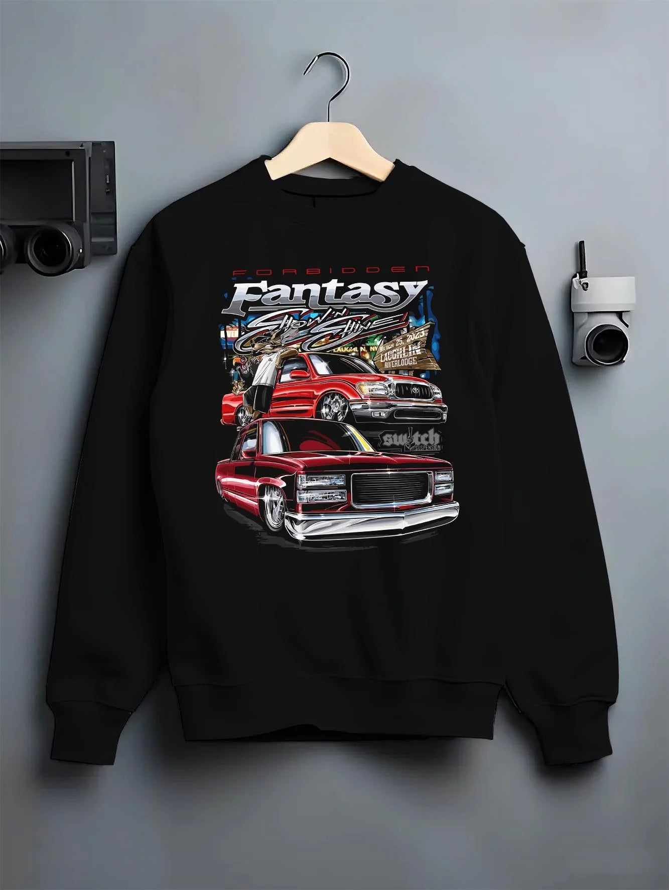 Black crewneck sweatshirt on a hanger against a grey wall, featuring BMW E30 jdm japanese retro vintage classic enthusiast graphic.