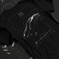 Black T-shirt laid flat with natural fabric folds, featuring BMW rs turbo racing drift motorsport german street retro graphic.