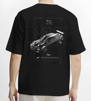 Black T-shirt worn by a male model, back view, featuring BMW M3 gtr rs turbo racing le mans motorsport german street graphic.