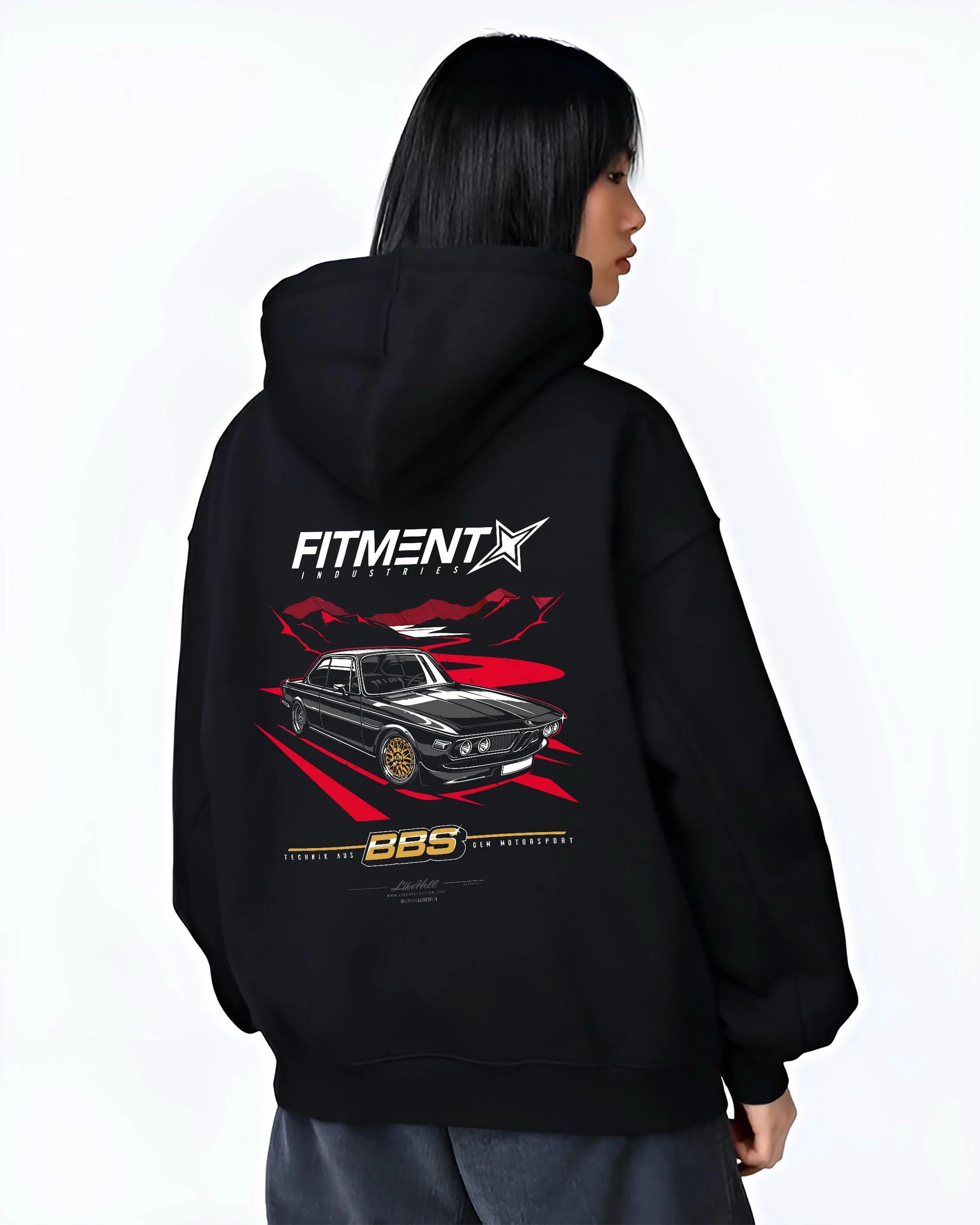 Black hoodie worn by a female model, back view, featuring BMW rs turbo ls racing motorsport euro street retro classic graphic.