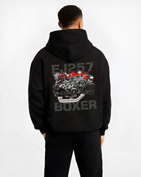 Black hoodie worn by a male model, back view, featuring Subaru turbo turbocharged racing rally jdm japanese tuner power graphic.