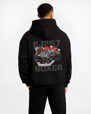 Black hoodie worn by a male model, back view, featuring Subaru turbo turbocharged racing rally jdm japanese tuner power graphic.