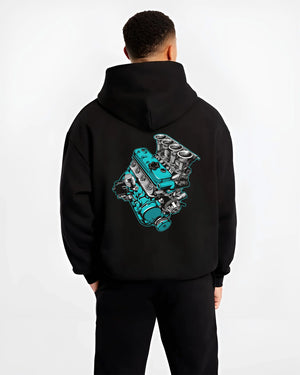 Black hoodie worn by a male model, back view, featuring tuning racing street performance motorsport automotive enthusiast graphic.
