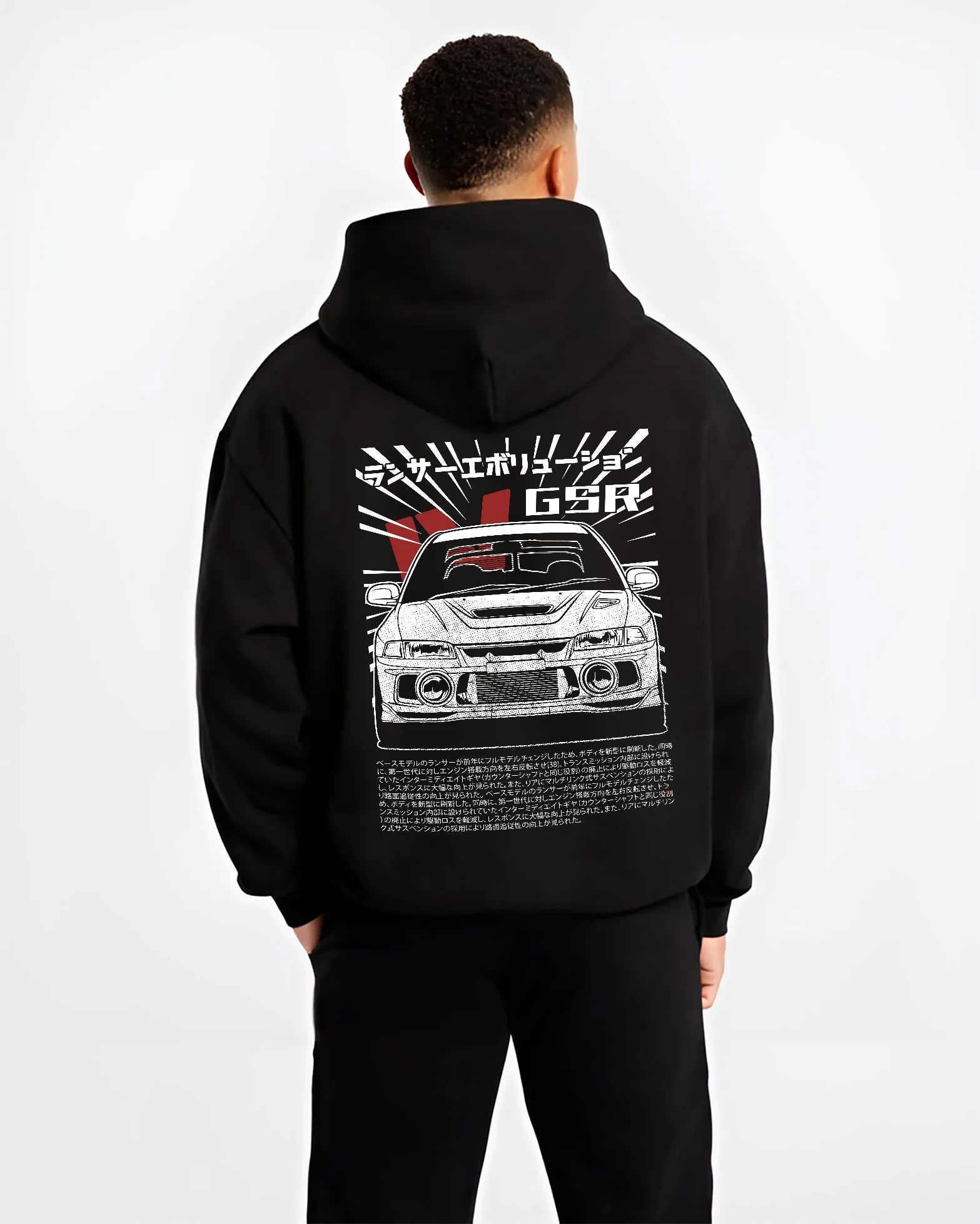 Black hoodie worn by a male model, back view, featuring Mitsubishi EVO lancer turbo racing drift jdm japanese street graphic.
