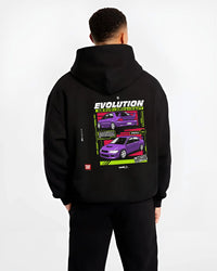 Black hoodie worn by a male model, back view, featuring Mitsubishi Lancer Evo VII evo lancer turbo racing jdm street graphic.