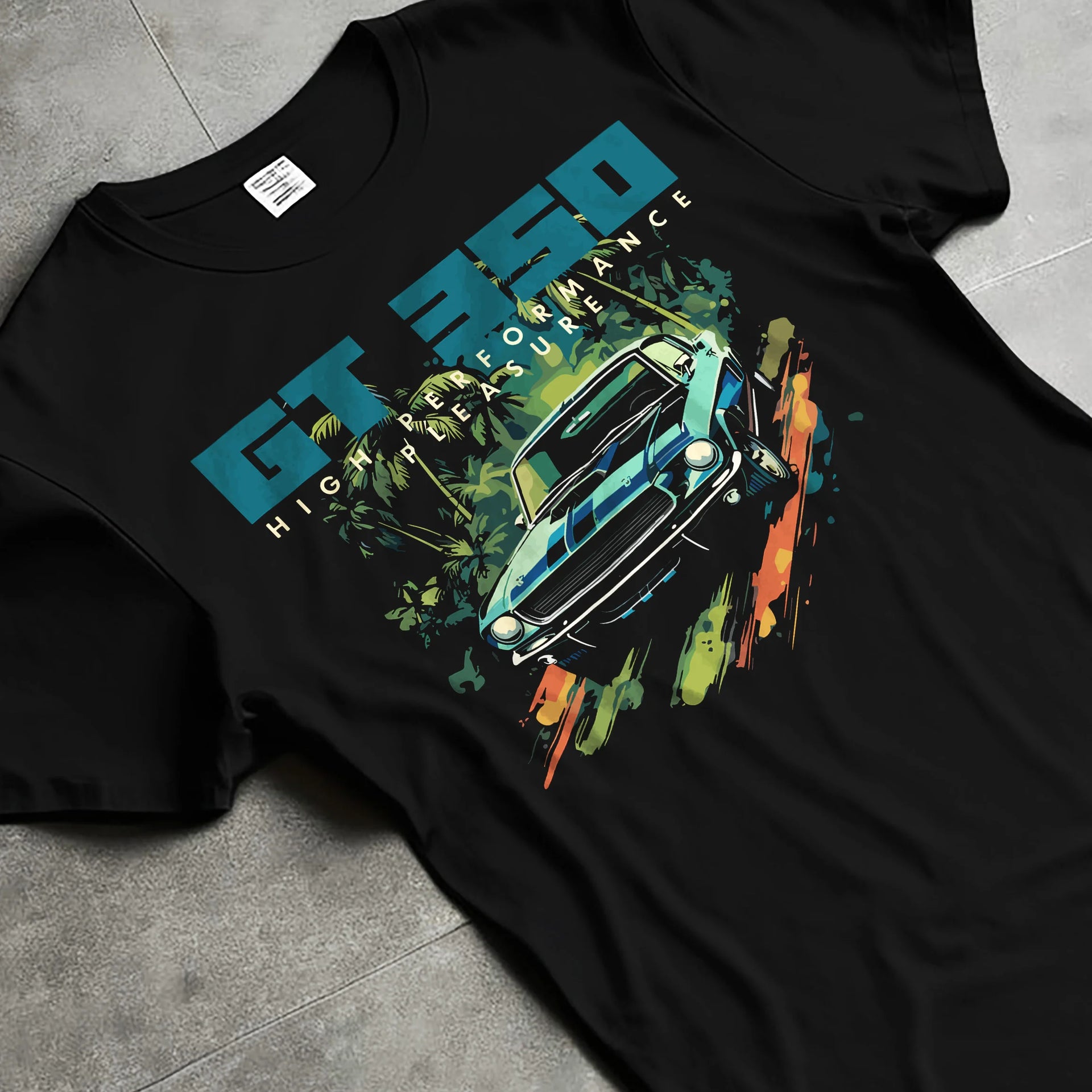 Black T-shirt laid flat with natural fabric folds, featuring Ford Mustang street retro classic enthusiast racing graphic.
