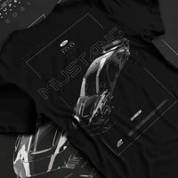 Black T-shirt laid flat with natural fabric folds, featuring Ford Mustang rs muscle street classic racing performance graphic.