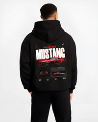 Black hoodie worn by a male model, back view, featuring Ford Mustang v8 american muscle street classic iconic power graphic.
