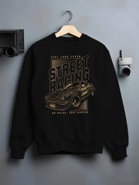 Black crewneck sweatshirt on a hanger against a grey wall, featuring rs racing motorsport tuner street retro performance graphic.