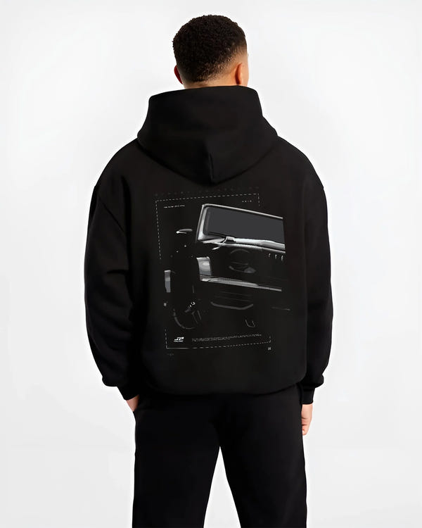 Black hoodie worn by a male model, back view, featuring Mercedes-Benz AMG rs racing street performance motorsport graphic.