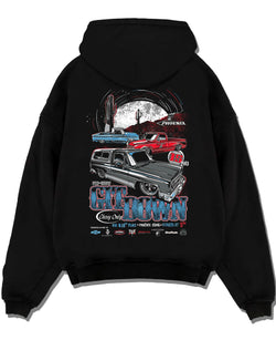 Black pullover hoodie laid flat on a white background, featuring Chevrolet retro vintage classic enthusiast show racing graphic.