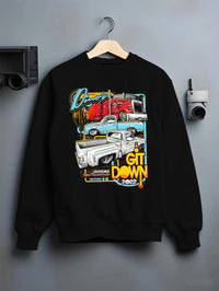 Black crewneck sweatshirt on a hanger against a grey wall, featuring street retro classic show racing performance graphic.