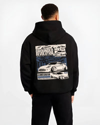 Black hoodie worn by a male model, back view, featuring EVO drift jdm japanese stance slammed street racing graphic.