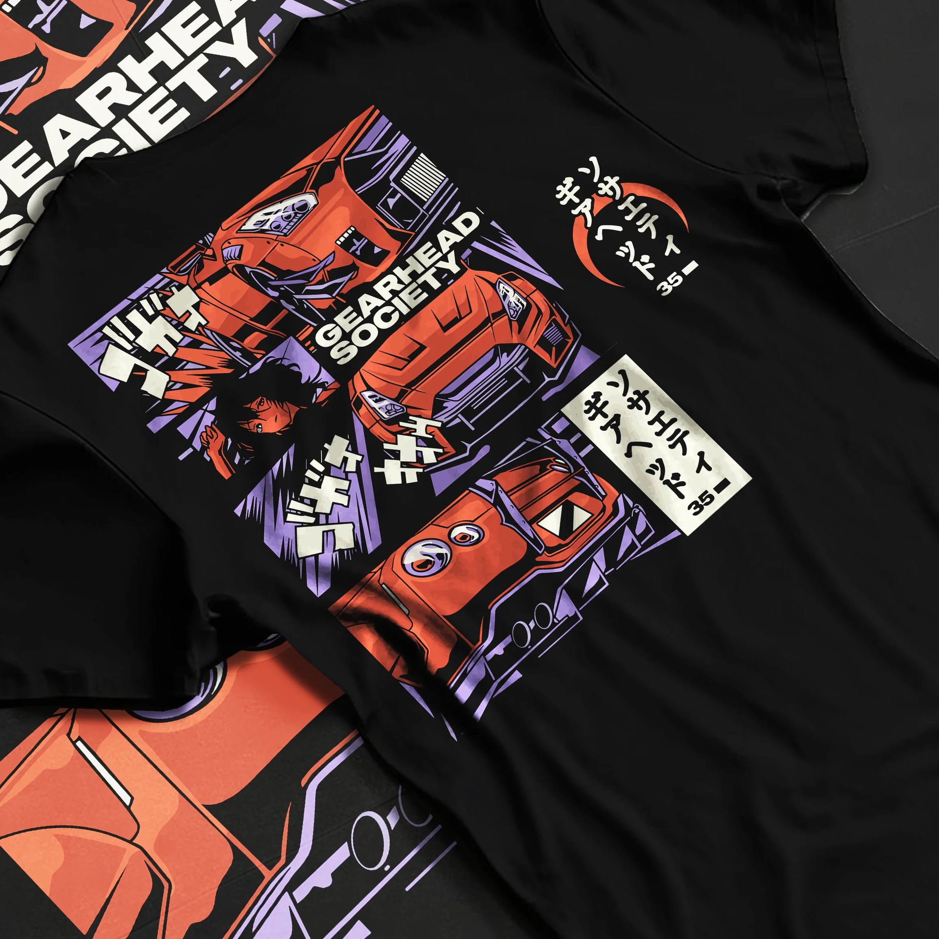 Black T-shirt laid flat with natural fabric folds, featuring drift jdm japanese gearhead racing street performance graphic.