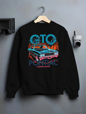 Black crewneck sweatshirt on a hanger against a grey wall, featuring Pontiac GTO muscle street retro vintage classic graphic.