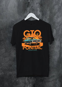 Black crewneck T-shirt on a hanger against a grey wall, featuring Pontiac GTO rs muscle street retro vintage classic graphic.