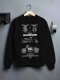 Black crewneck sweatshirt on a hanger against a grey wall, featuring Harley-Davidson Fxdr street retro enthusiast racing graphic.