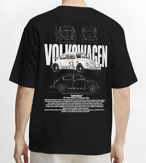 Black T-shirt worn by a male model, back view, featuring Volkswagen Beetle racing classic legend street performance graphic.