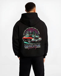 Black hoodie worn by a male model, back view, featuring Dodge Charger muscle retro racing street performance motorsport graphic.