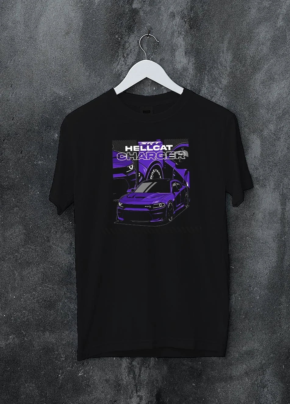Black crewneck T-shirt on a hanger against a grey wall, featuring Dodge Charger Hellcat hellcat srt charger racing muscle graphic.