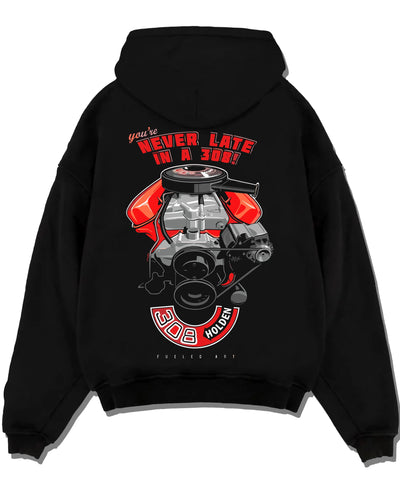 Black pullover hoodie laid flat on a white background, featuring v8 muscle street classic power racing performance graphic.