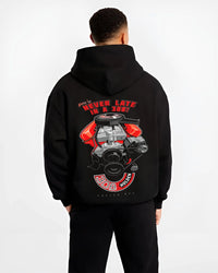 Black hoodie worn by a male model, back view, featuring v8 muscle street classic power racing performance motorsport graphic.