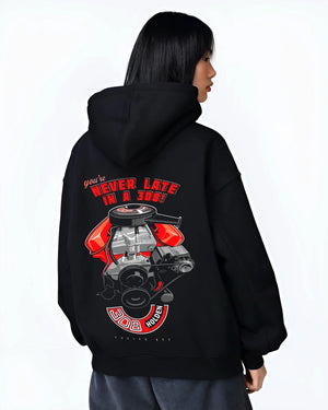 Black hoodie worn by a female model, back view, featuring v8 muscle street classic power racing performance motorsport graphic.