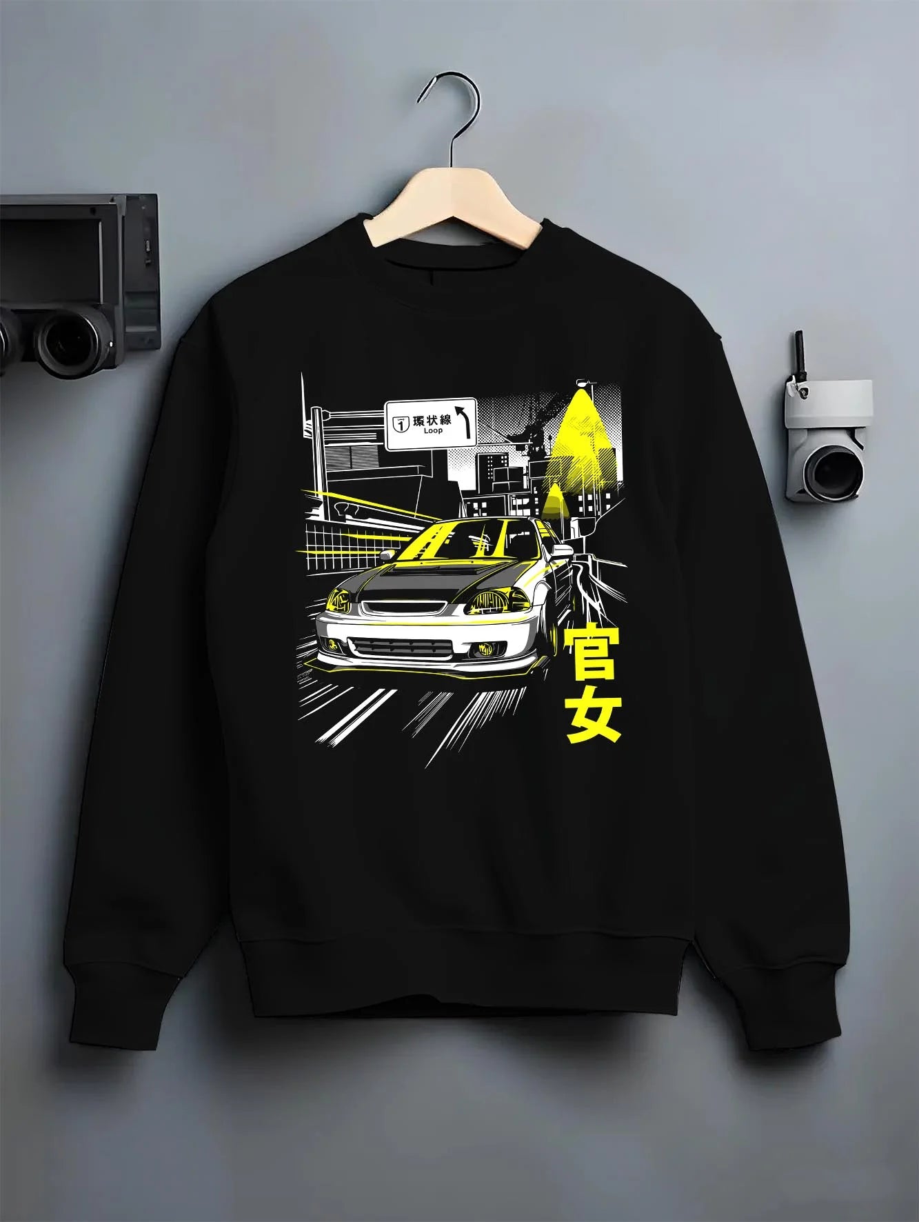 Black crewneck sweatshirt on a hanger against a grey wall, featuring Honda Civic racing drift jdm japanese street graphic.