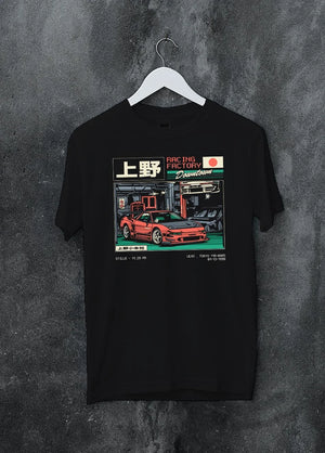 Black crewneck T-shirt on a hanger against a grey wall, featuring Honda rs racing motorsport street retro classic speed graphic.