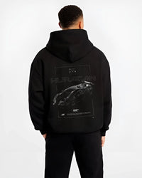 Black hoodie worn by a male model, back view, featuring Lamborghini Huracan gt3 evo racing enthusiast street performance graphic.