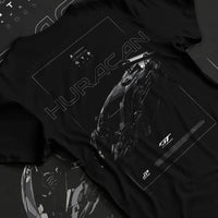 Black T-shirt laid flat with natural fabric folds, featuring Lamborghini Huracan gt3 evo racing enthusiast street graphic.