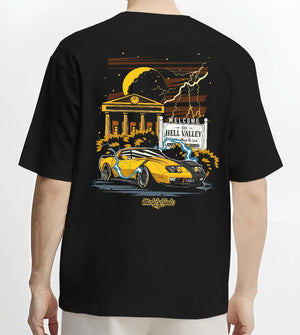 Black T-shirt worn by a male model, back view, featuring racing street retro performance motorsport automotive enthusiast graphic.