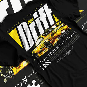 Black T-shirt laid flat with natural fabric folds, featuring racing drift jdm japanese tuner street legend performance graphic.