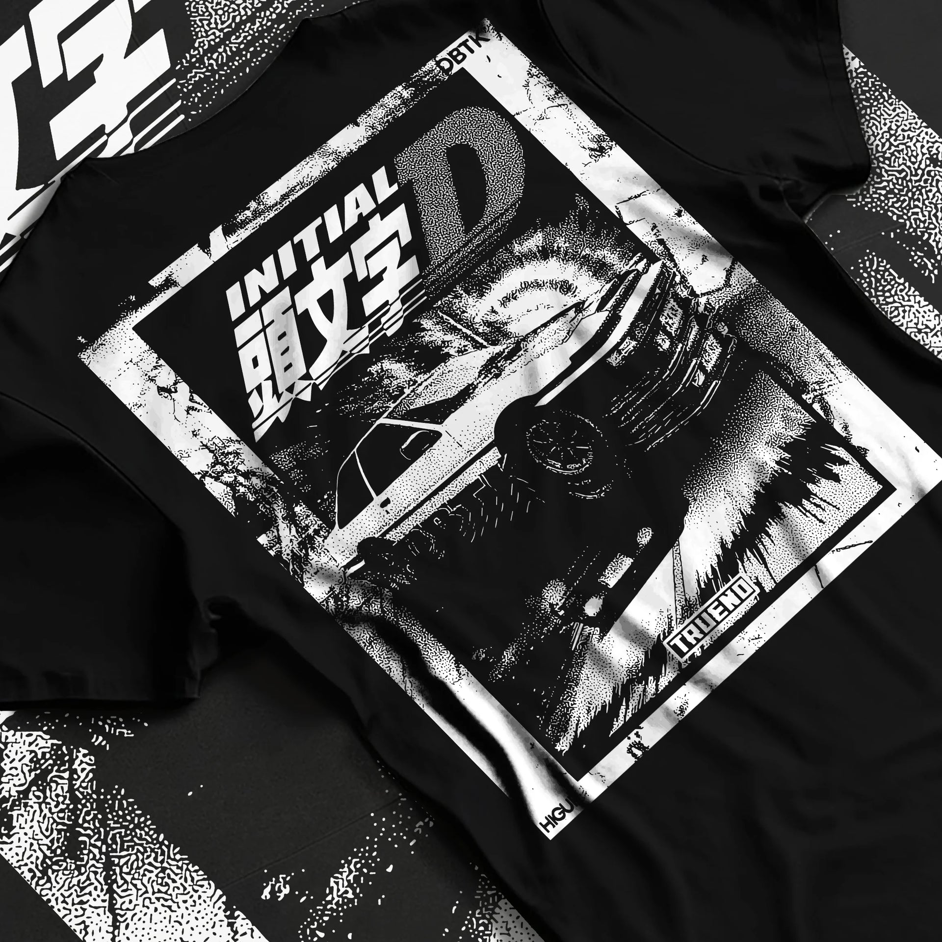 Black T-shirt laid flat with natural fabric folds, featuring racing drift jdm japanese initial d street legend performance graphic.