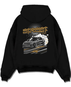 Black pullover hoodie laid flat on a white background, featuring Lexus rs drift tuner street enthusiast racing performance graphic.