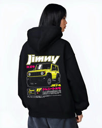 Black hoodie worn by a female model, back view, featuring Suzuki japanese racing street performance motorsport automotive graphic.