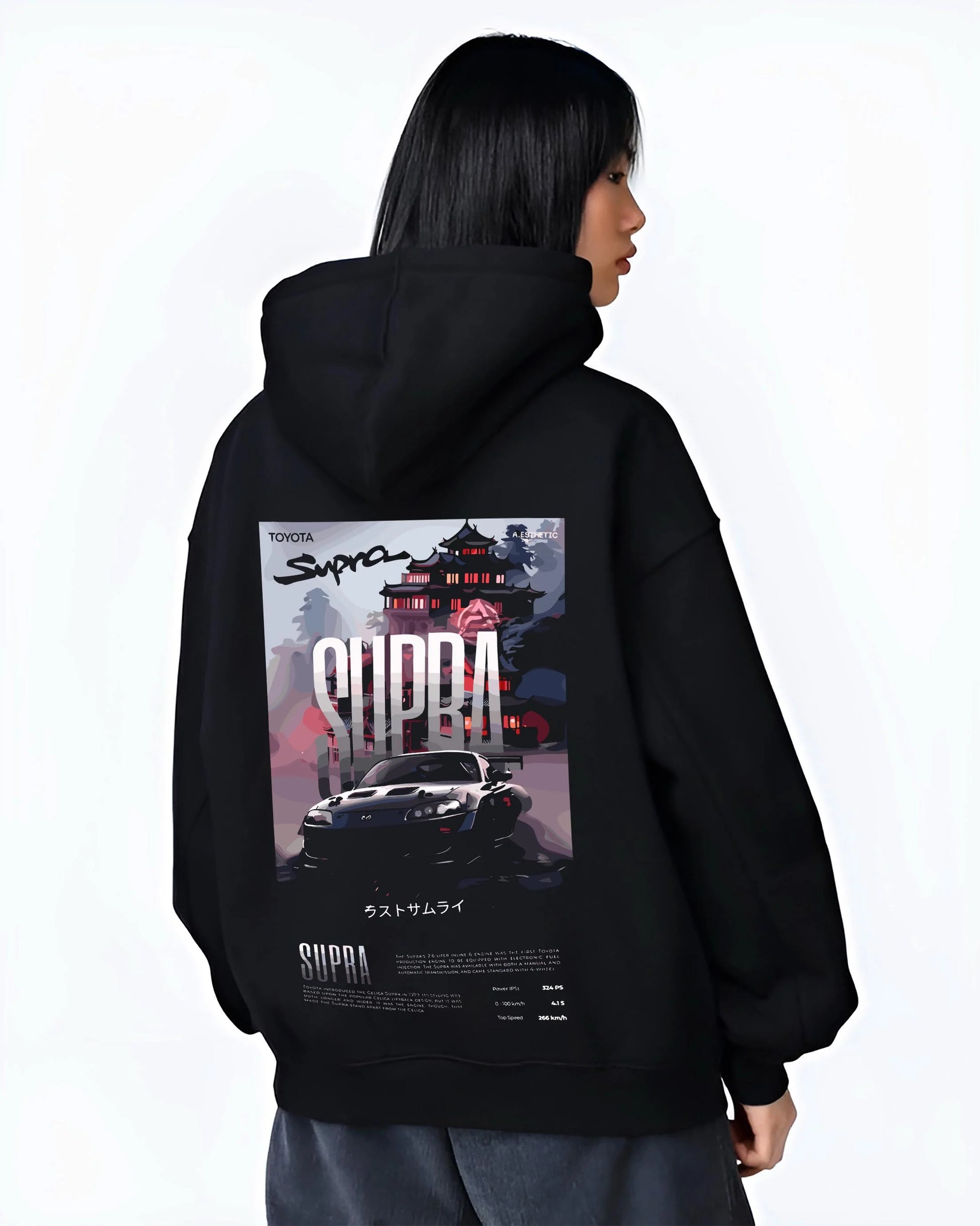 Black hoodie worn by a female model, back view, featuring Toyota Supra racing jdm japanese enthusiast street performance graphic.