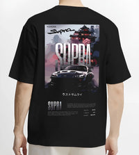 Black T-shirt worn by a male model, back view, featuring Toyota Supra racing jdm japanese enthusiast street performance graphic.