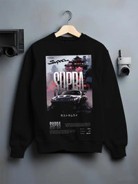 Black crewneck sweatshirt on a hanger against a grey wall, featuring Toyota Supra racing jdm japanese enthusiast street graphic.