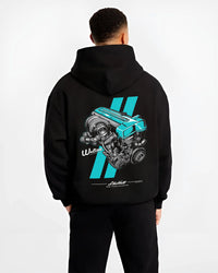Black hoodie worn by a male model, back view, featuring Toyota turbo 2jz drift jdm japanese tuner enthusiast graphic.