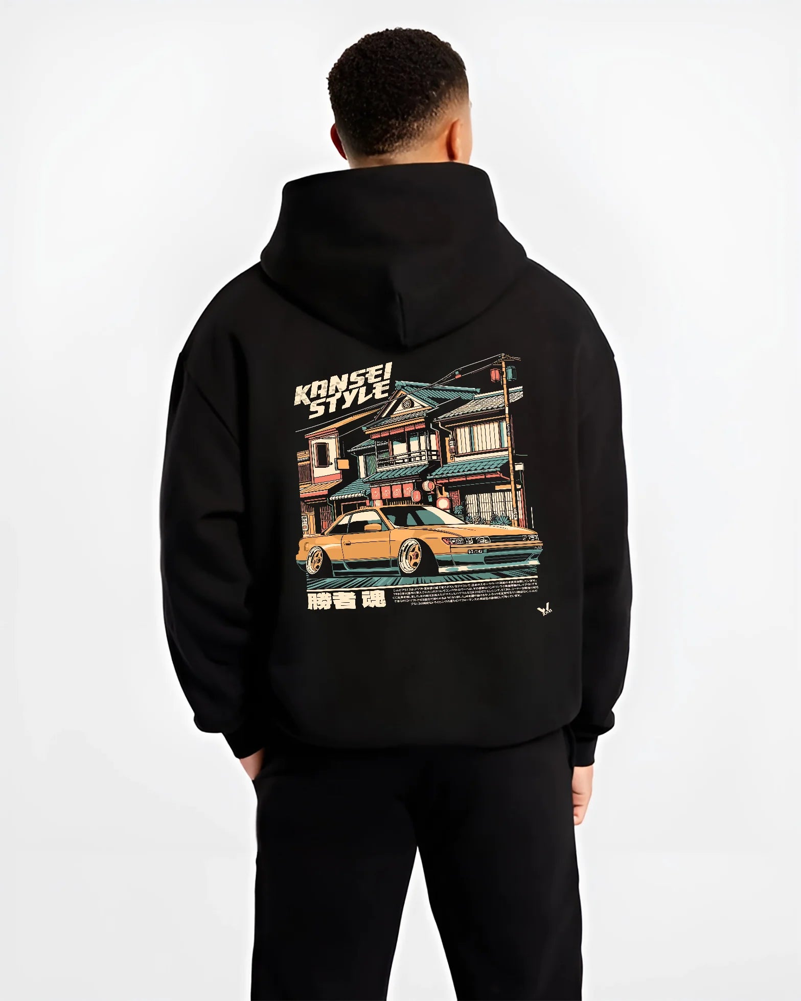 Black hoodie worn by a male model, back view, featuring racing drift jdm japanese street performance motorsport automotive kansei.