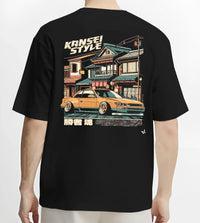 Black T-shirt worn by a male model, back view, featuring racing drift jdm japanese street performance motorsport automotive kansei.
